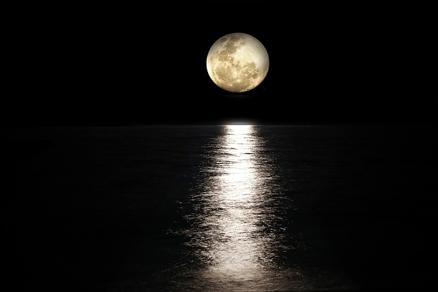 MOON WITH REFLECTION IN THE WATER