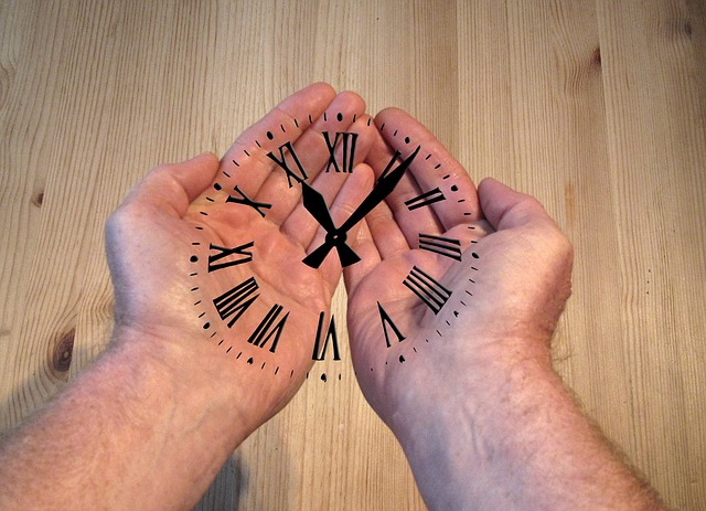 HAND WITH CLOCK