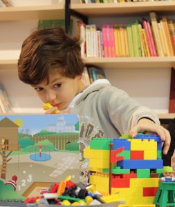 Boy playing legos