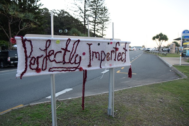 sign that says "perfectly imperfect"