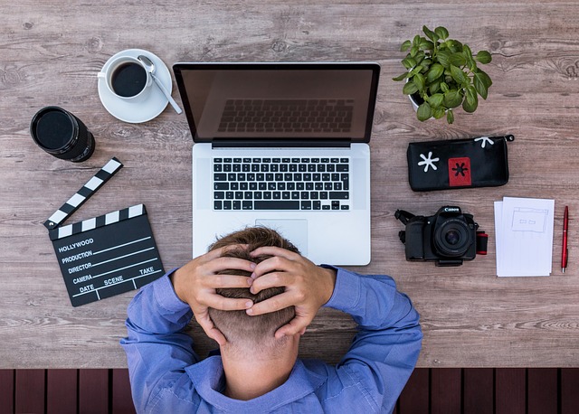 MAN OVER COMPUTER