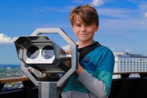 BOY WITH TELESCOPE