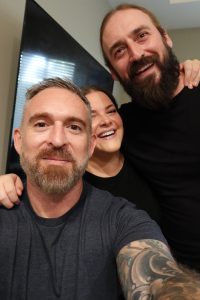 author with friend and boyfriend