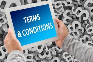 tablet with words terms and conditions